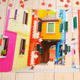 A jigsaw of some colourful buildings.